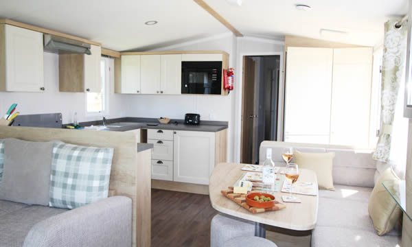 Typical layout and interior of a static caravan holiday home at Looe Country Park